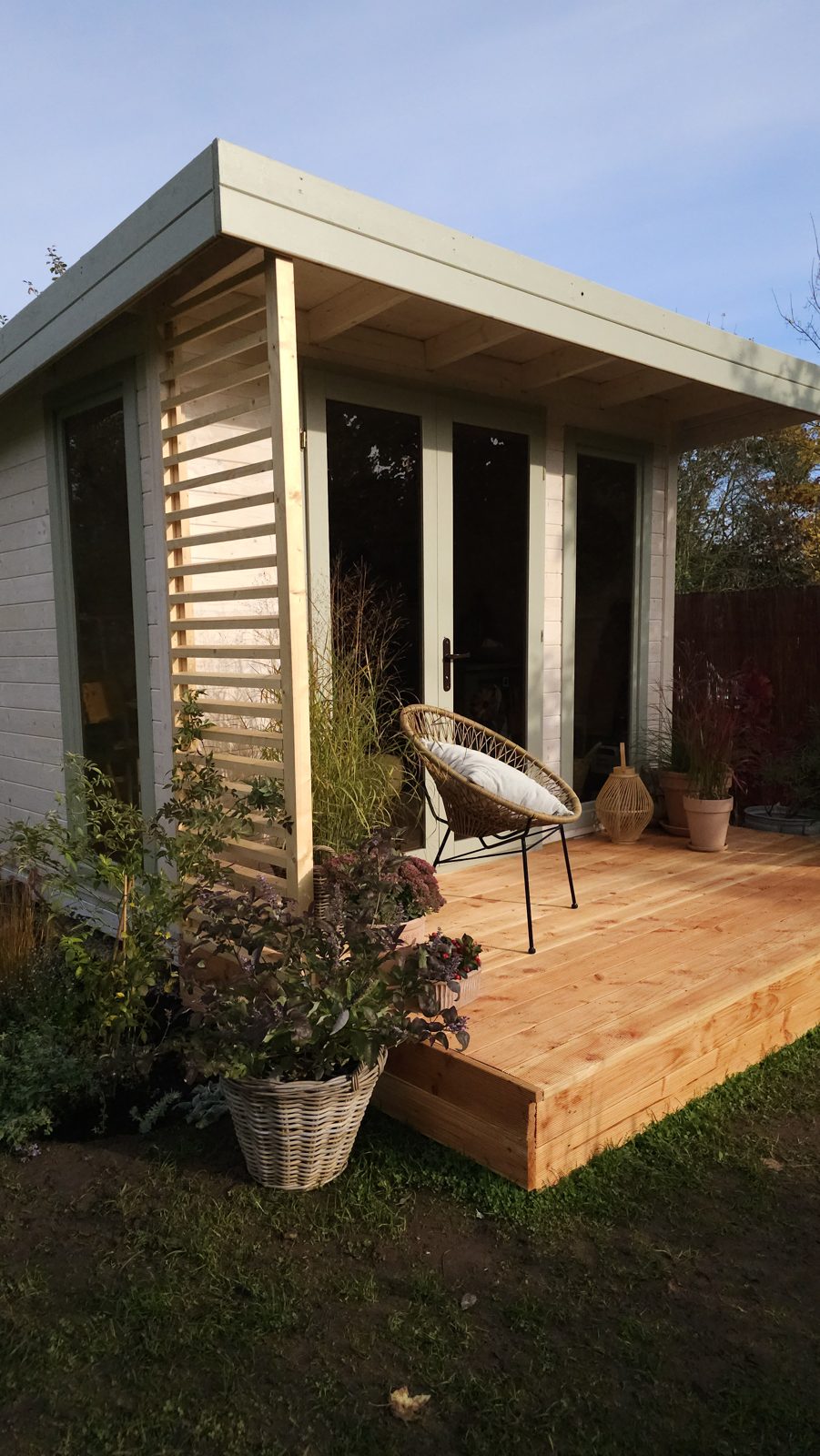 Gartenhaus Arvo mit Veranda im Abendlicht